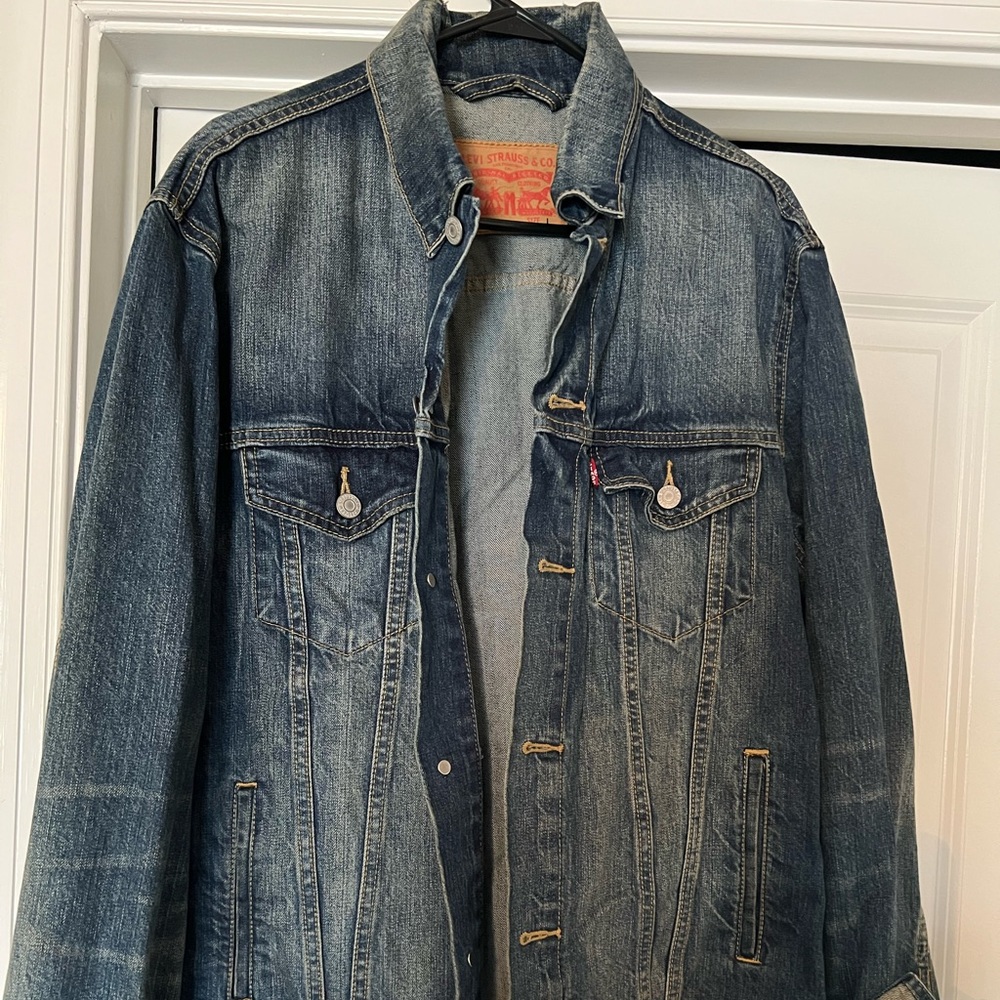 Up for sale is a Levi Strauss & Co. Denim Jean jacket.